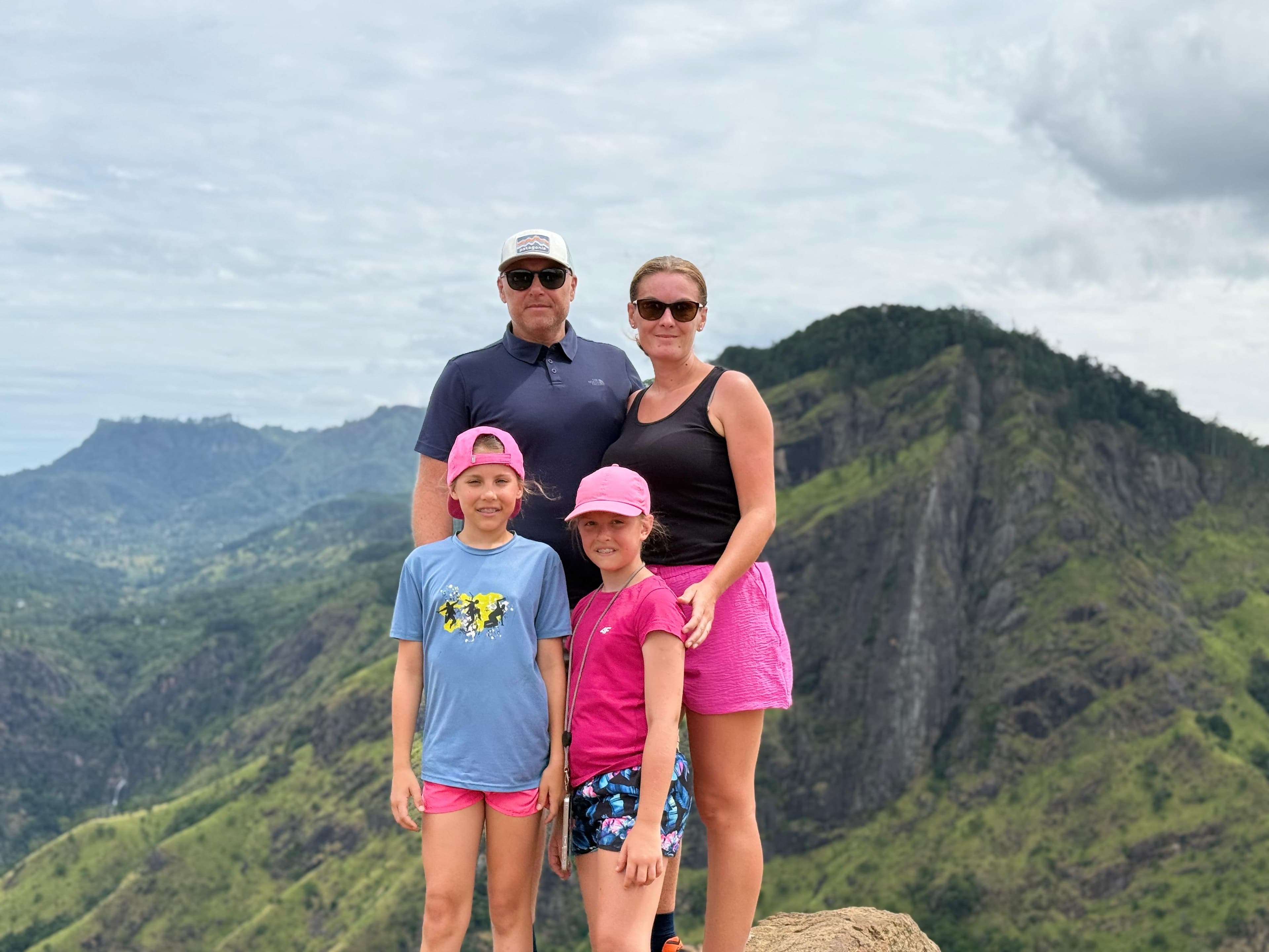 Family at a mountain ridge viewpoint