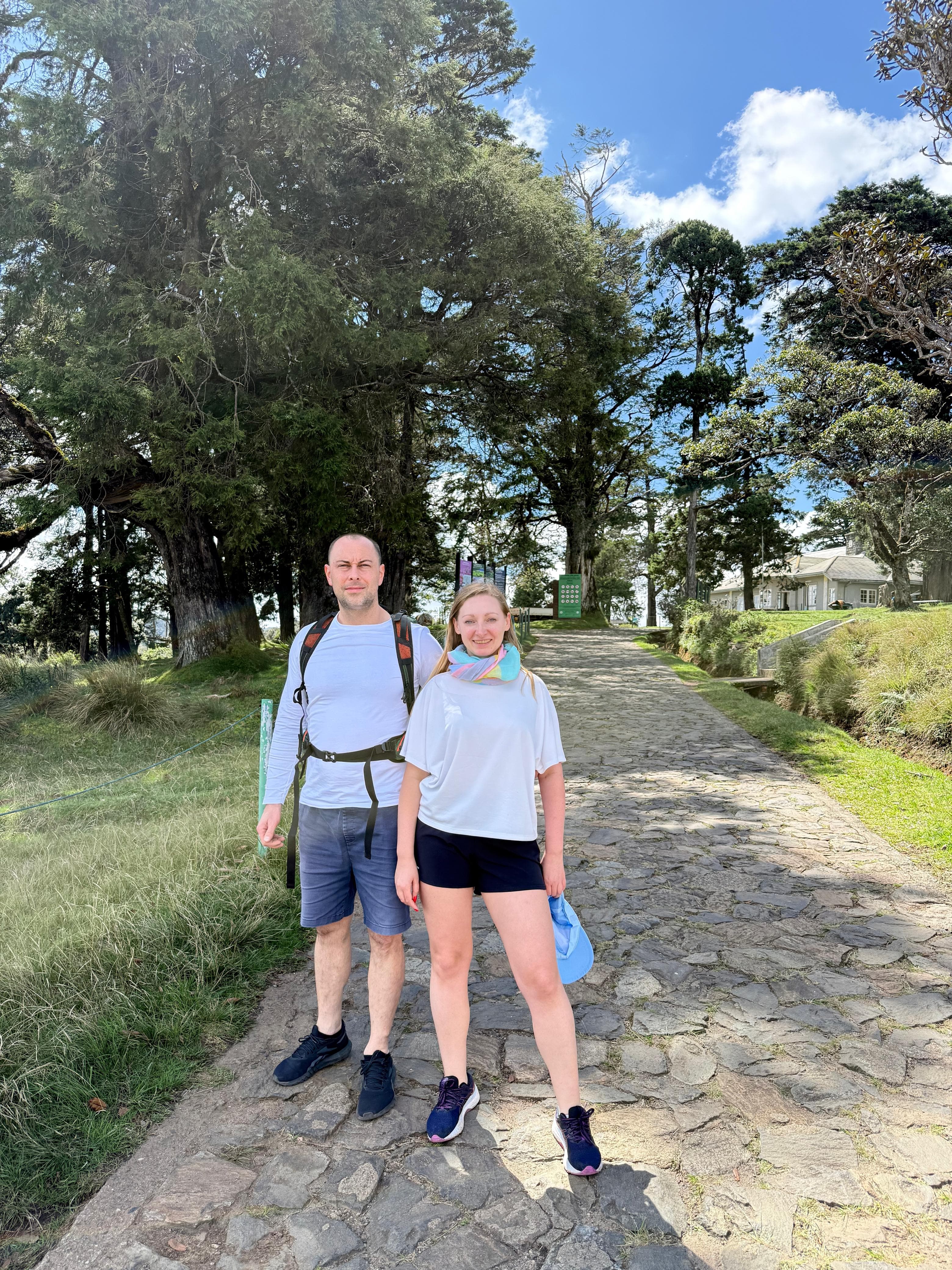 Couple hiking the forest path at Horton Plains