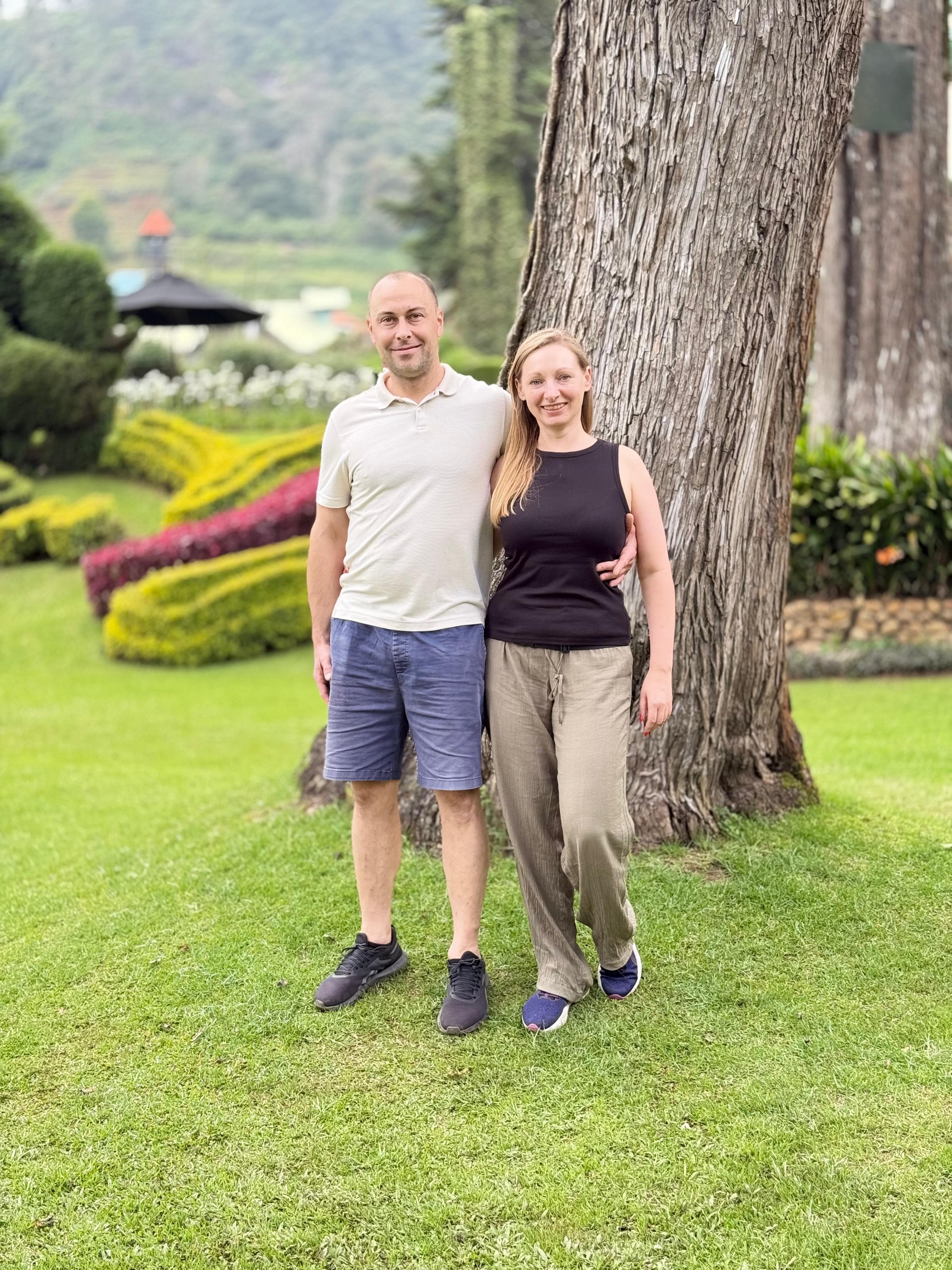 Couple portrait under a garden tree