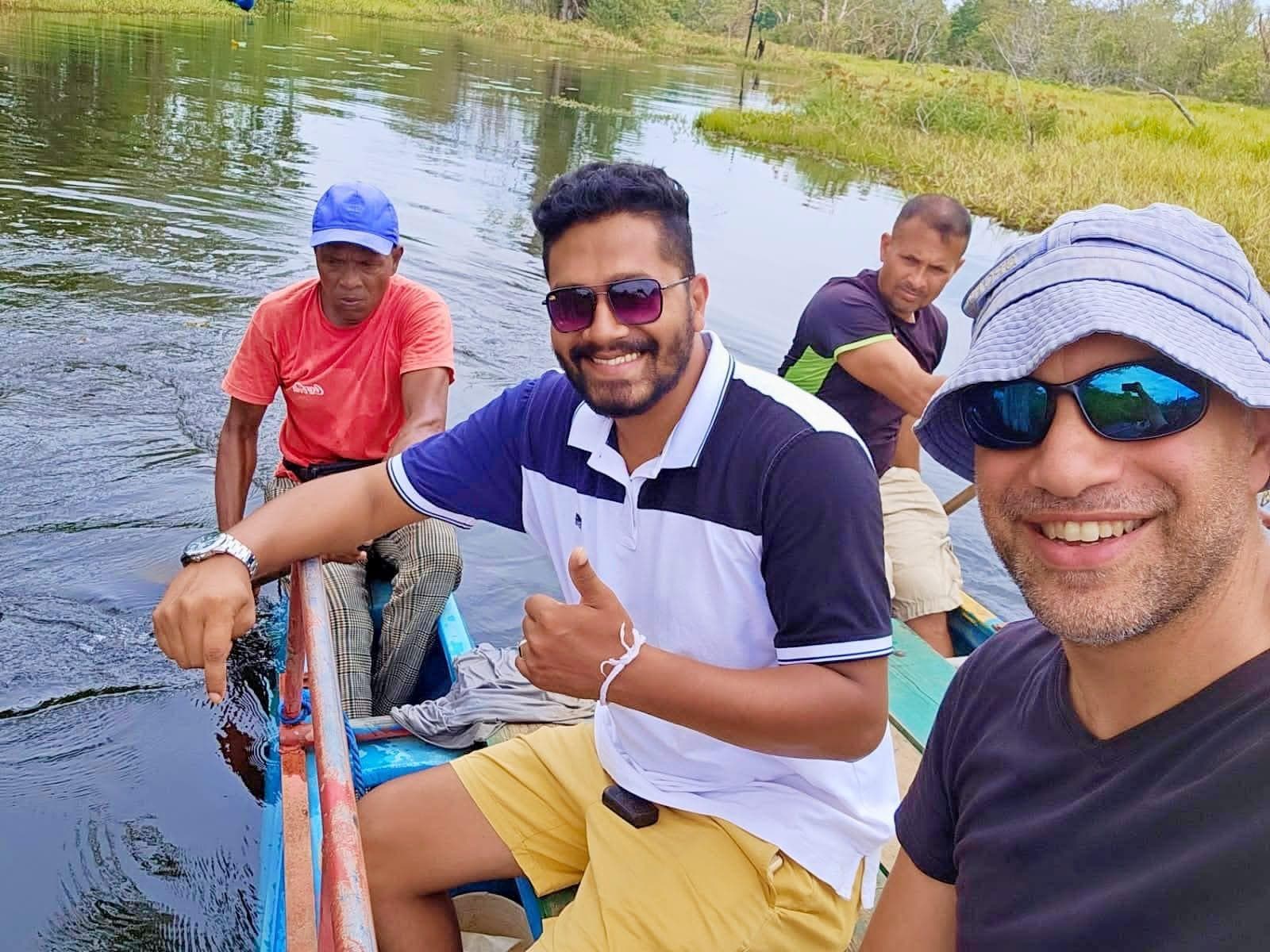 Men on a boat during a river safari tour