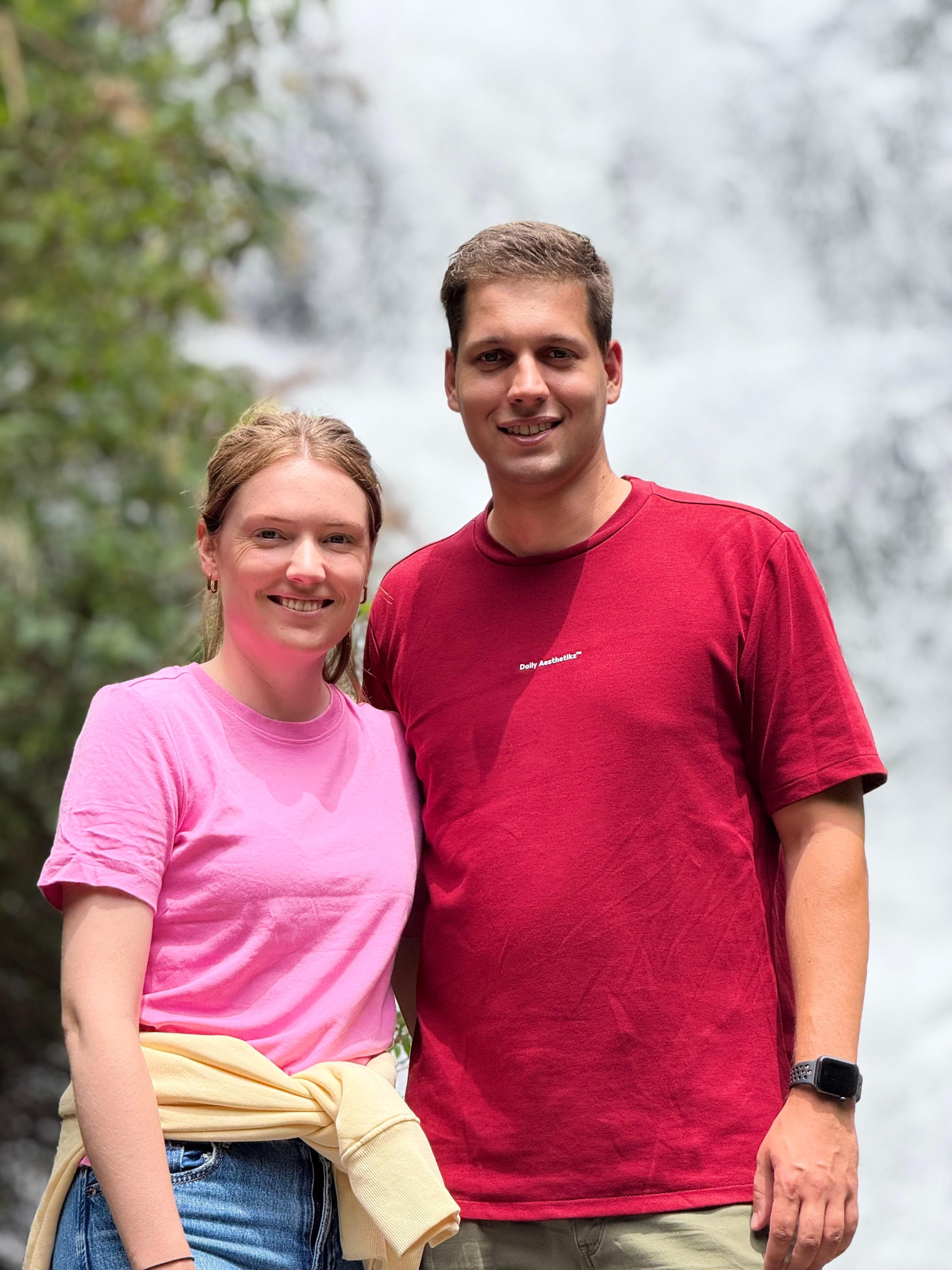 Close-up couple portrait at a waterfall