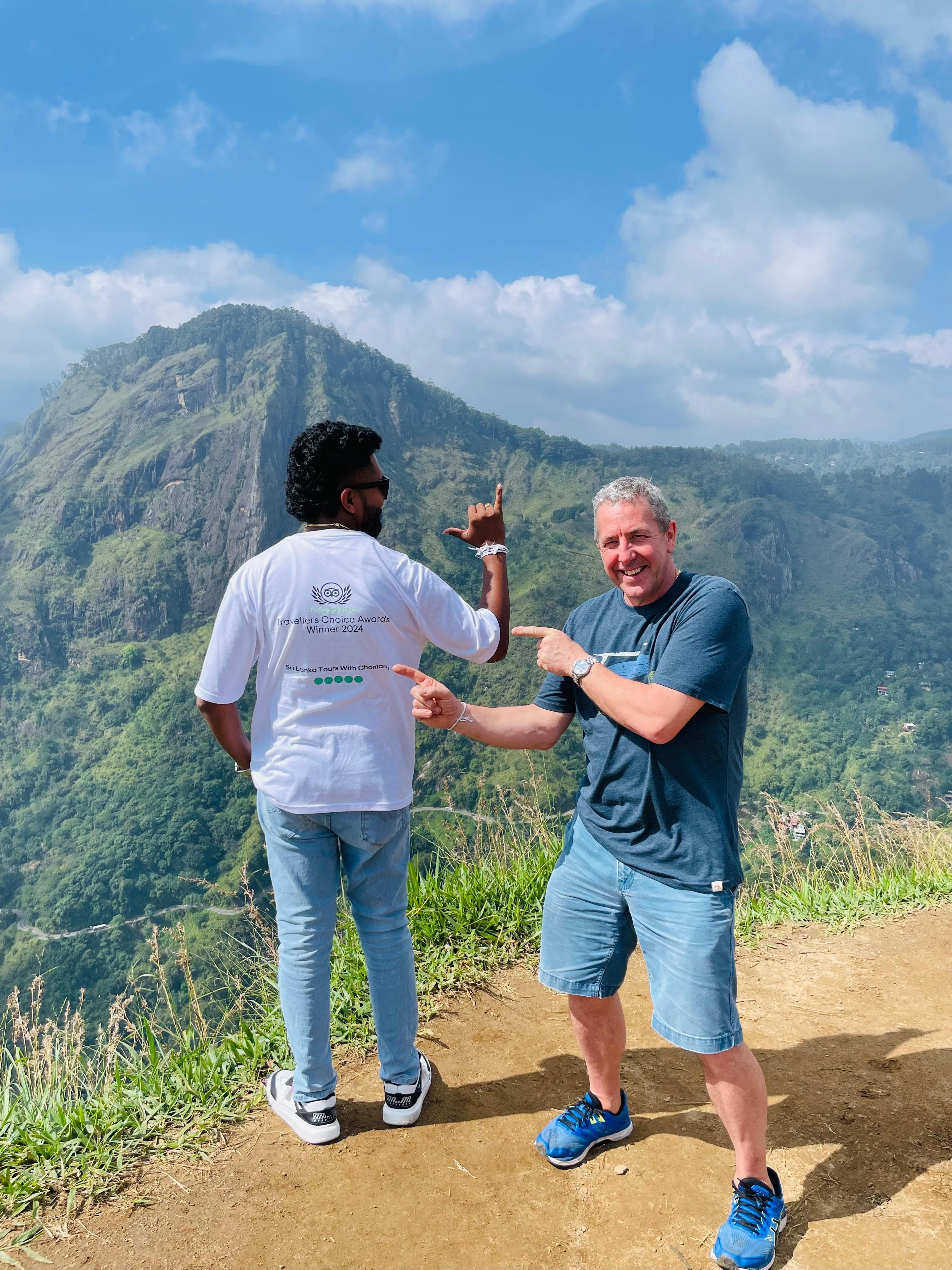 Guide and guest at a mountain viewpoint