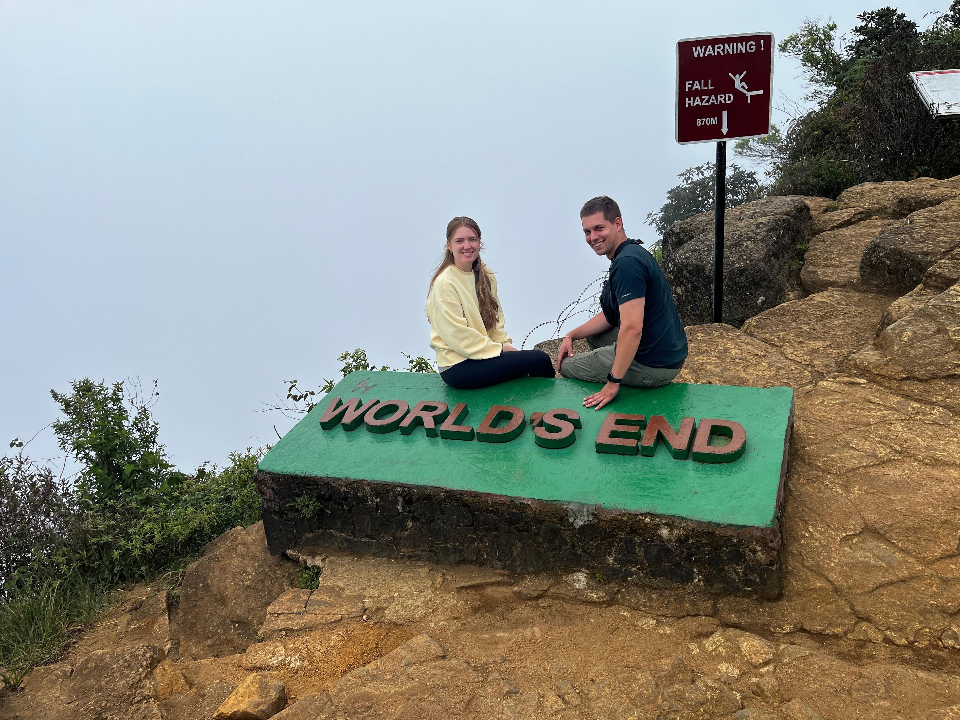 Couple at the World's End sign in Horton Plains