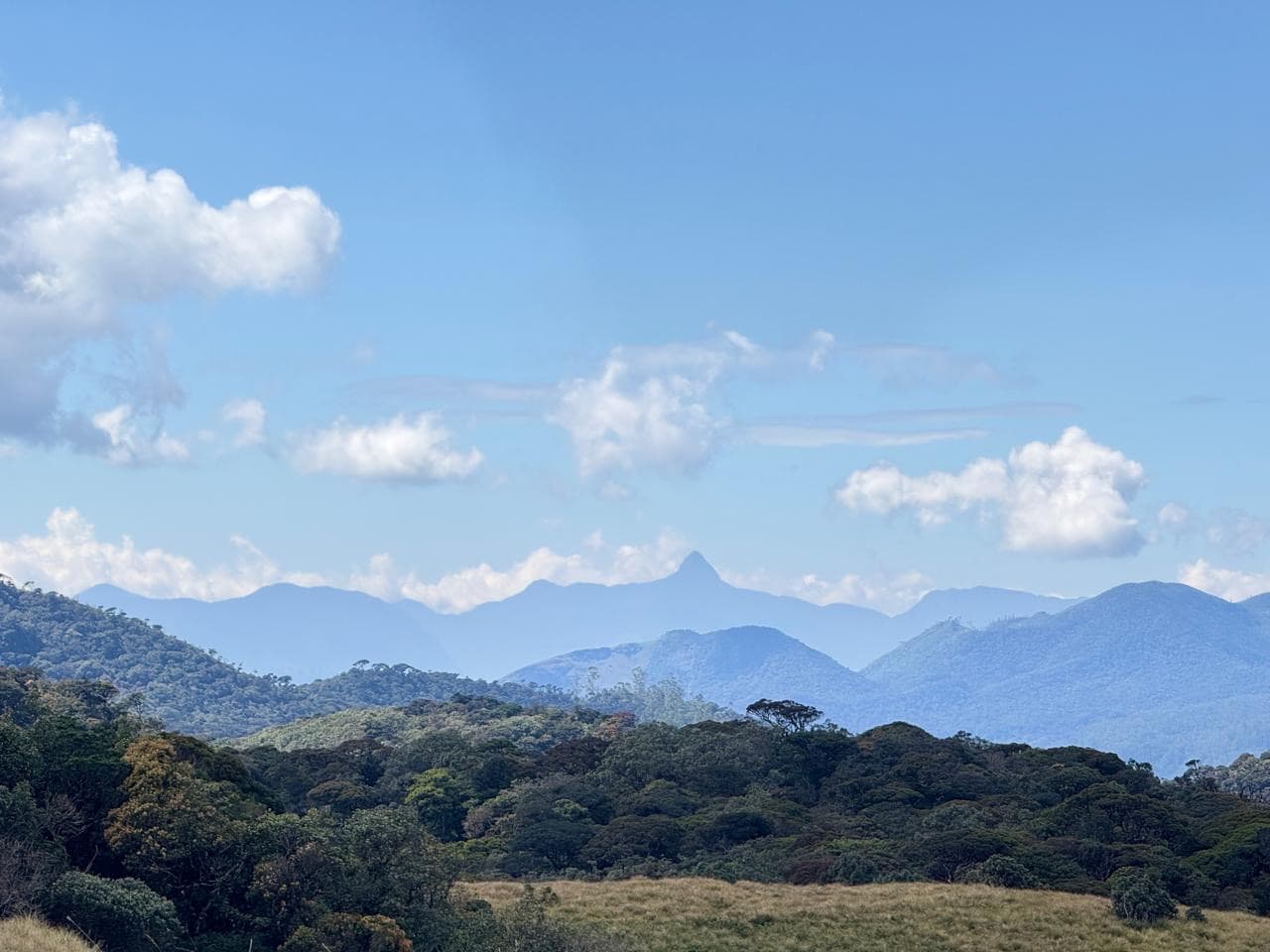 Adam's Peak seen from a distant mountain view