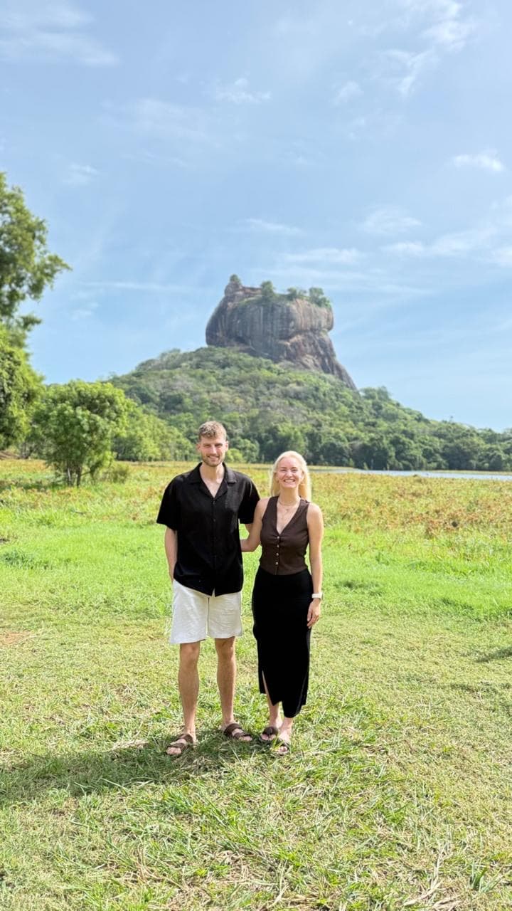 Couple portrait in the field at Sigiriya rock