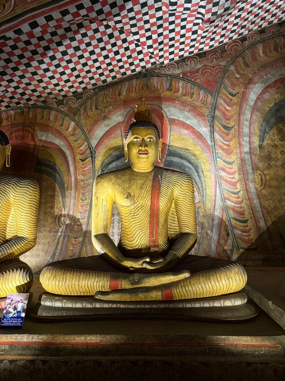 Golden Buddha statue at the Dambulla cave temple