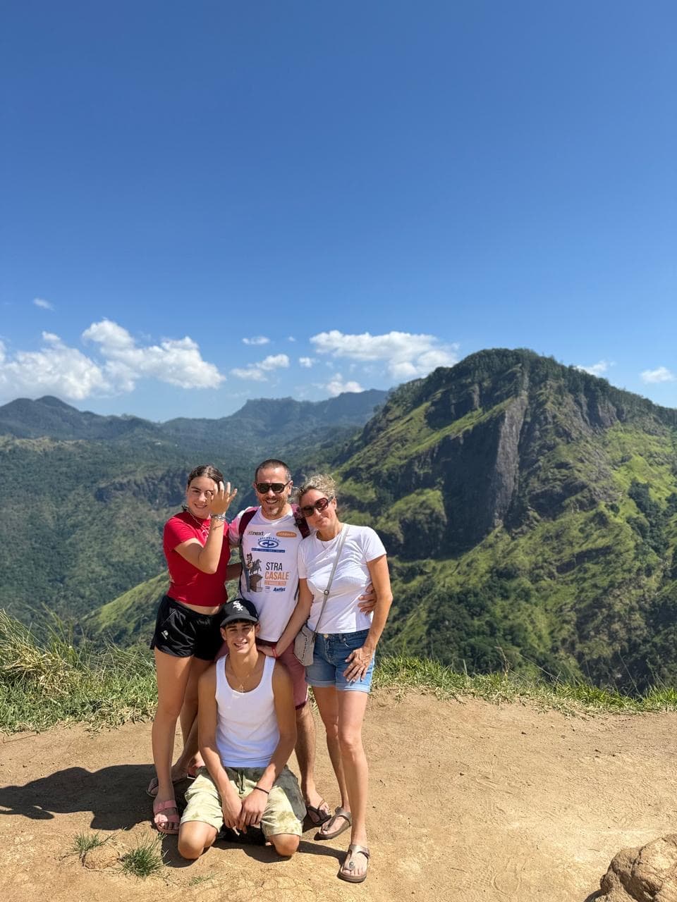 Family at a mountain ridge viewpoint