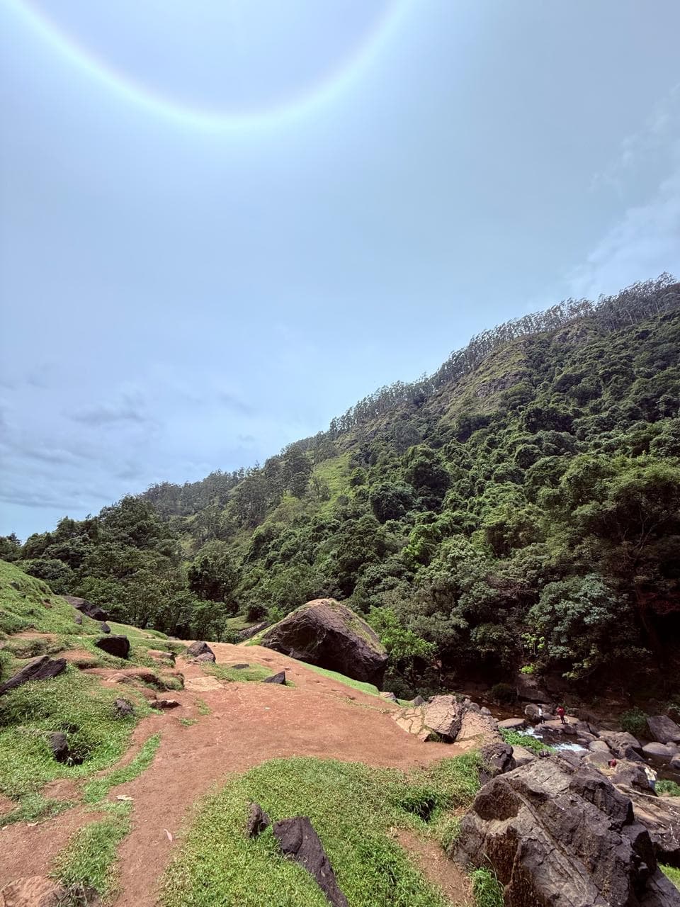 Mountain valley with a sun halo view