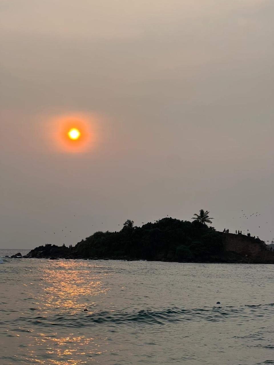Parrot Rock island at sunset in Mirissa