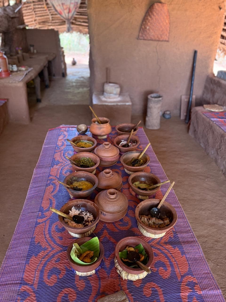 Traditional village clay pot rice and curry spread