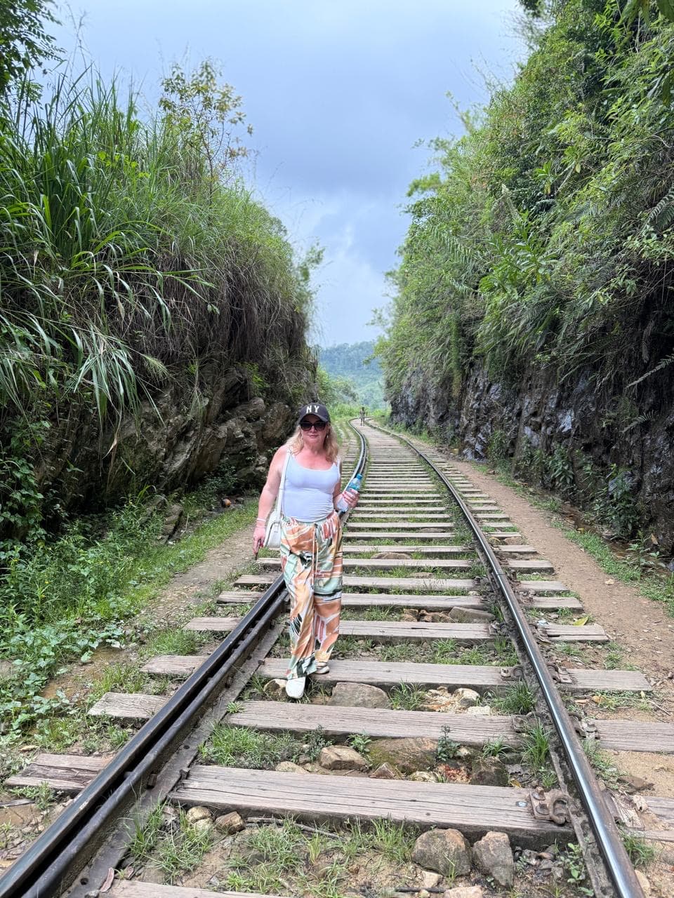 Woman on the railway track near Nine Arches Bridge